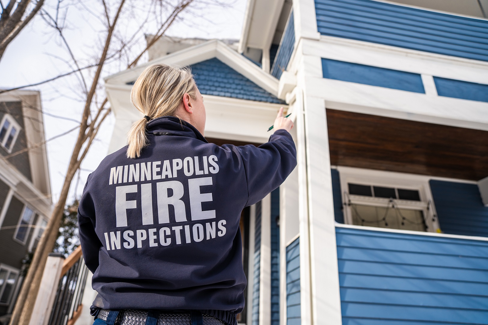 fire inspector looking at home