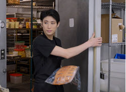 Restaurant employee with food Restaurant employee with food
